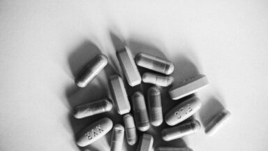 Photo by Anna Tarazevich: https://www.pexels.com/photo/a-grayscale-photo-of-medication-pills-7904443/
