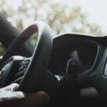 Photo by Daniel Andraski: https://www.pexels.com/photo/dashboard-and-steering-wheel-of-a-car-11512458/
