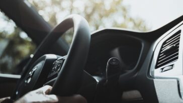 Photo by Daniel Andraski: https://www.pexels.com/photo/dashboard-and-steering-wheel-of-a-car-11512458/